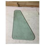 Approximately 15 triangular shaped glass windows