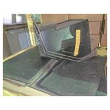 Two plastic chair bottoms and miscellaneous floor