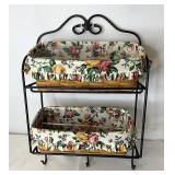 Wrought iron envelope shelf including baskets