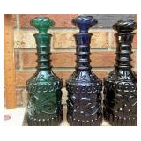 Three glass decanters
