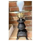Cast iron wood burning stove lamp