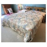 King size bed on two box springs linens included