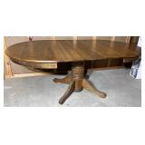 Oak dining room table extends to 6 foot with