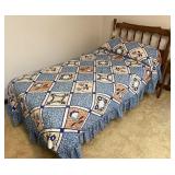 Twin bed with linens