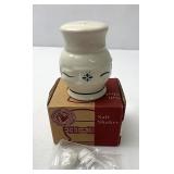 Green salt shaker with two corks