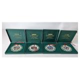 Set of four hometown Christmas ornaments