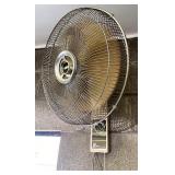 Oscillating wall fan