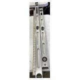 Levels and metal yardstick