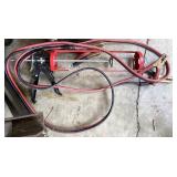 Caulking gun and jumper cables