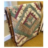 Quilt rack with quilt