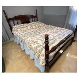 Queen bed with linens