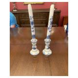 Glass candleholders with candles
