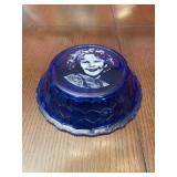 Blue glass bowl with a picture of Shirley Temple