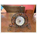 Small rod iron clock