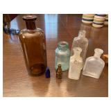 Primitive glass bottles