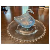 Glass plate and blue glass swan