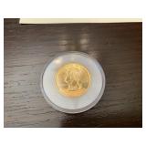 The Morgan meant 24 Kt. Gold plated quarter