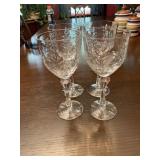 Four large stemware glasses