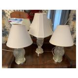 Three glass lamps