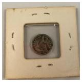 1857 seated liberty half dime in holder,