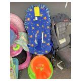 Baby bouncer and green and orange chair