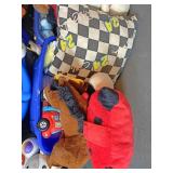 Tote of stuffed animals and more