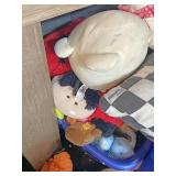 Laundry basket of stuffed animals