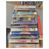 A lot of VHS tapes to include Tom and Huck little