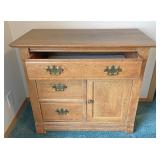 Oak washstand with raised panel sides and back