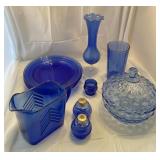 Blue glass plates, candy dish, small pitcher,