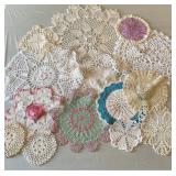 Handmade various sized scalloped edge doilies