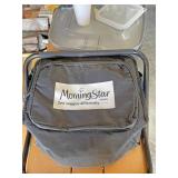 Folding chair with handy bag