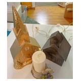 Lighted churches and candle arrangement