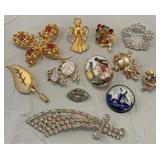 Various styles of broaches rhinestone and other