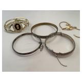 Silver and other bracelets