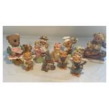 Various bears and cat figurines
