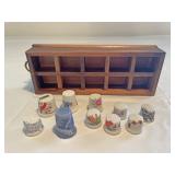 Small thimble collection and shelf
