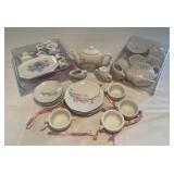 Three miniature tea sets