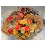 Various wreaths and flower centerpiece