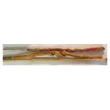 Three hand carved and decorated walking canes