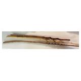 Three hand carved and turned walking sticks