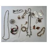 Necklaces charm bracelets and other jewelry