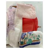 Box of miscellaneous towels and butt doughnut