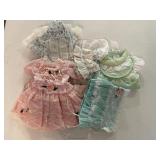 Fancy ruffled dresses, bonnets for dolls