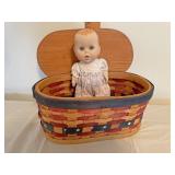 Porcelain baby in a basket