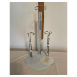 Three metal doll stands