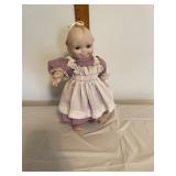 Porcelain kewpie doll