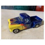 1955 Chevrolet truck model has some wear