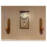 Wall sconce in clock