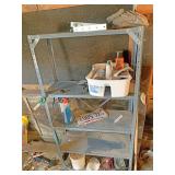 Five tiered metal shelf with contents